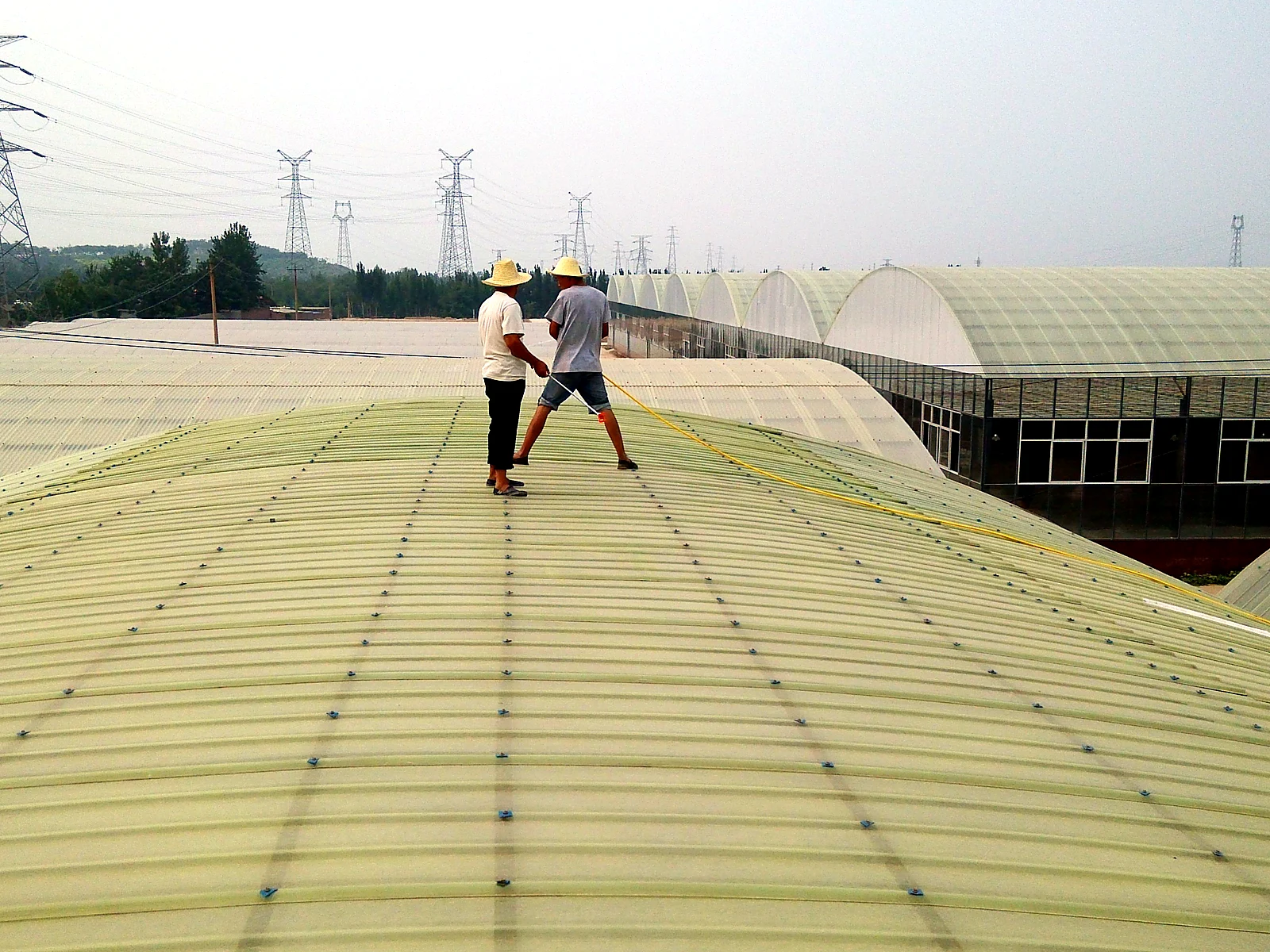 Large Arched Industrial Roof Reflective Coating, industrial site image 1