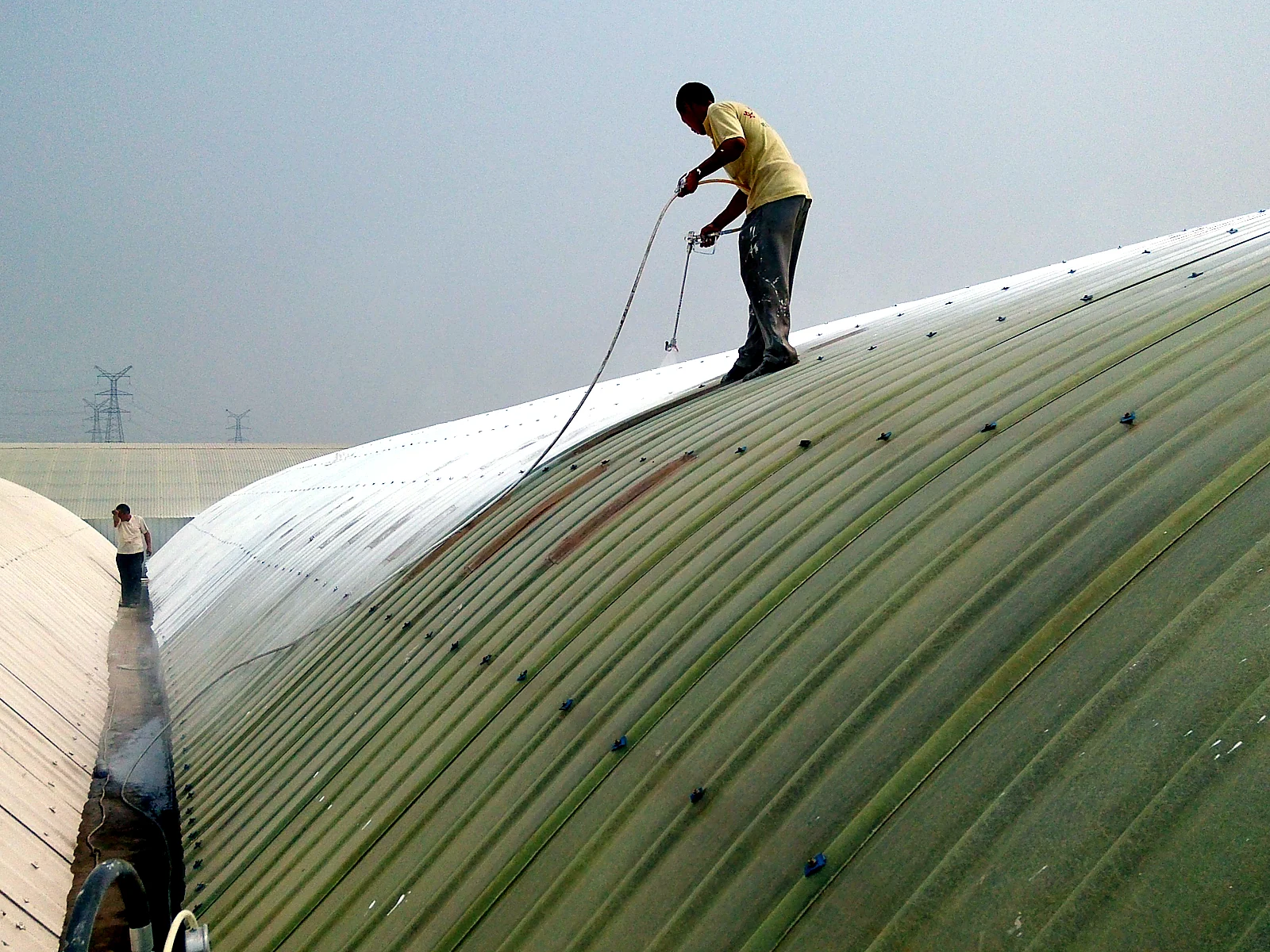 Large Arched Industrial Roof Reflective Coating, industrial site image 2