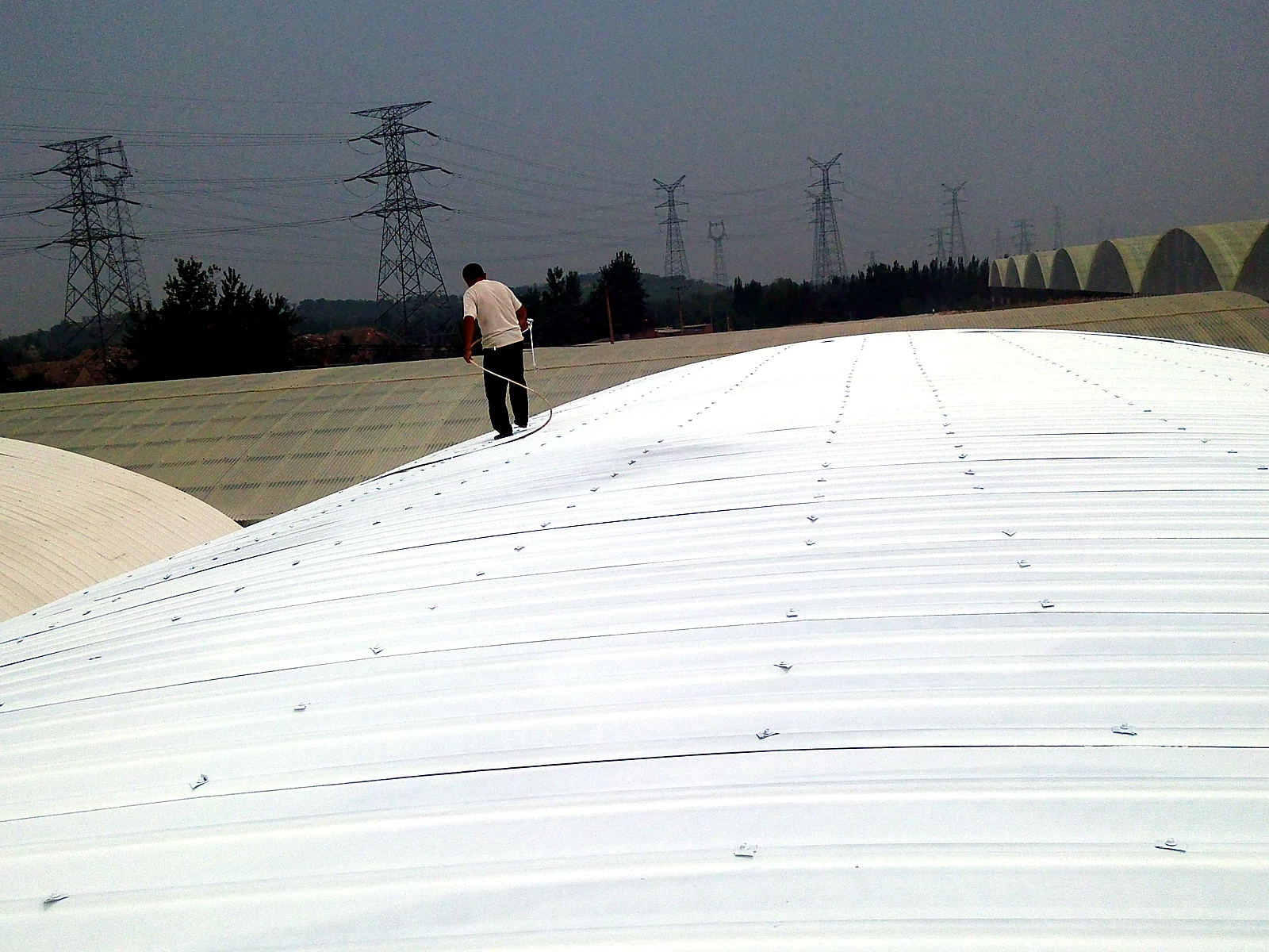 Large Arched Industrial Roof Reflective Coating, industrial site image 3