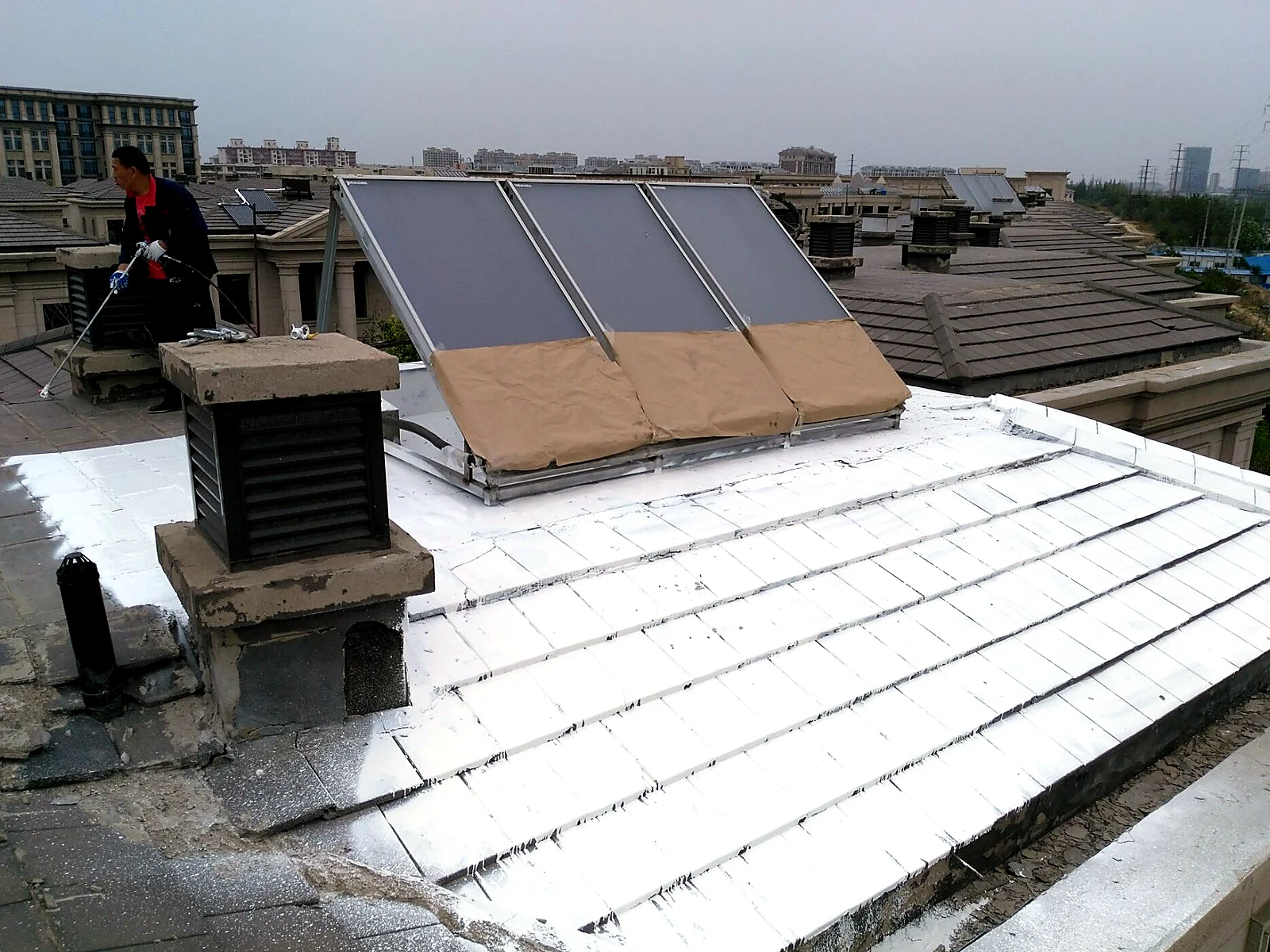 Concrete and Tile Roof Reflective Application, industrial site image